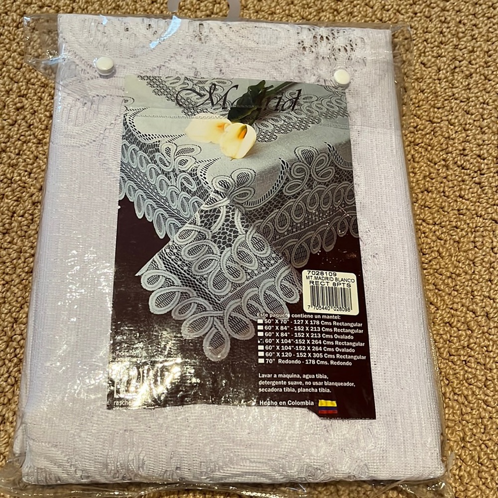White Lace Tablecloth New in package! 60"x104" rectangular